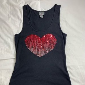 A black tank top with a red heart design!